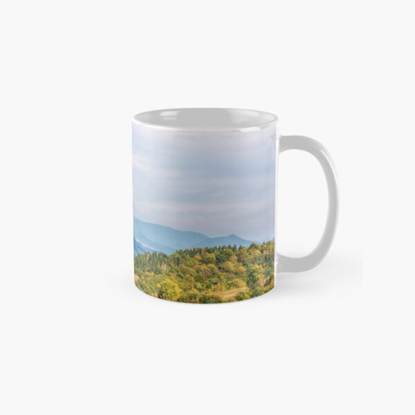 trees on a hill side near the mountain road Classic Mug