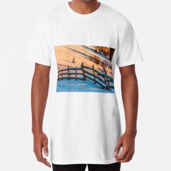 fence on snowy mountain slope near the forest in winter Long T-Shirt