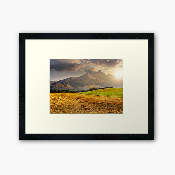 rural field in Tatra mountains at sunset Framed Art Print