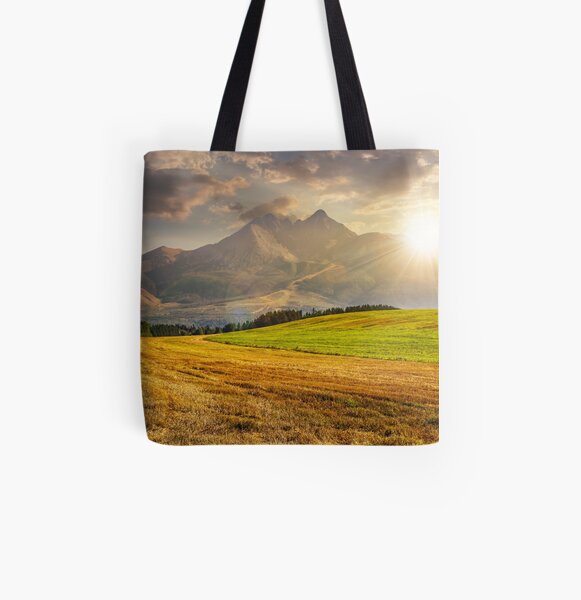 rural field in Tatra mountains at sunset All Over Print Tote Bag