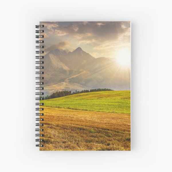 rural field in Tatra mountains at sunset Spiral Notebook