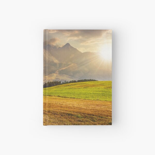 rural field in Tatra mountains at sunset Hardcover Journal