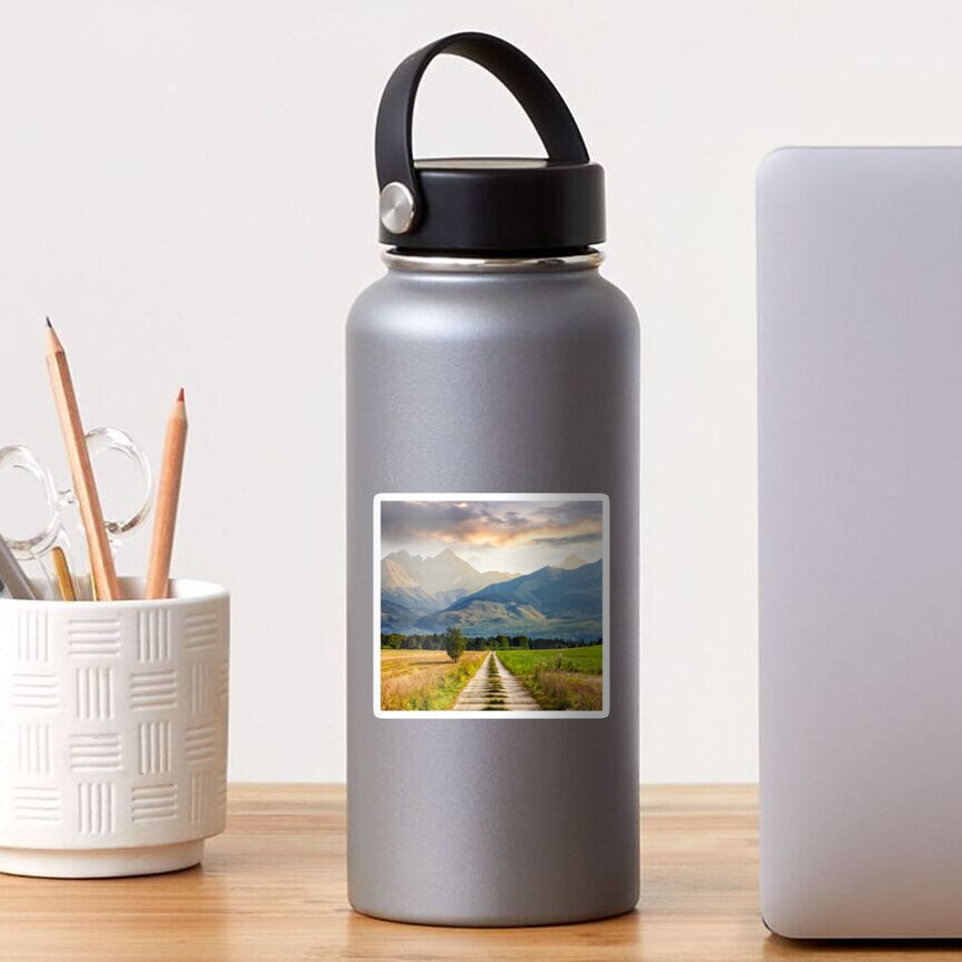Rural fields near the high mountains Sticker