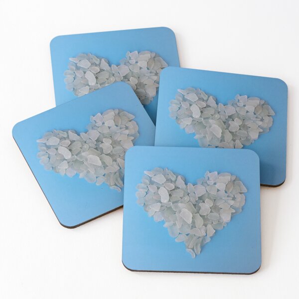 Item preview, Sea Glass in Heart Shape on Pale Blue Background Coastal Decor designed and sold by Beachy.