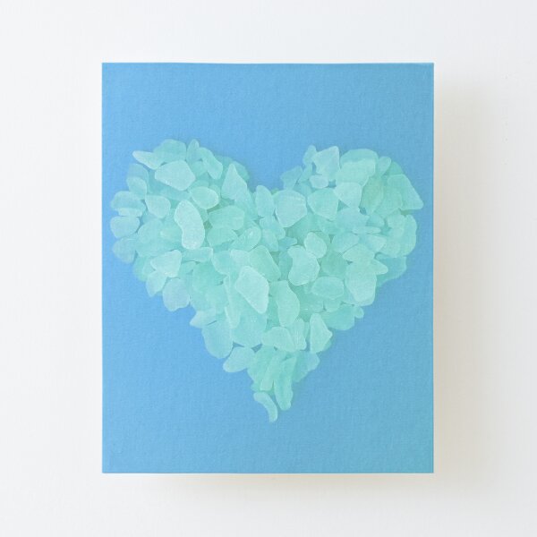 Soft Blue Sea Glass in Heart Shape on Lilac Background Soft Girl