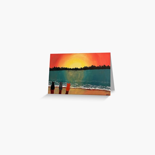 Three cats on a beach watching the sunset Greeting Card