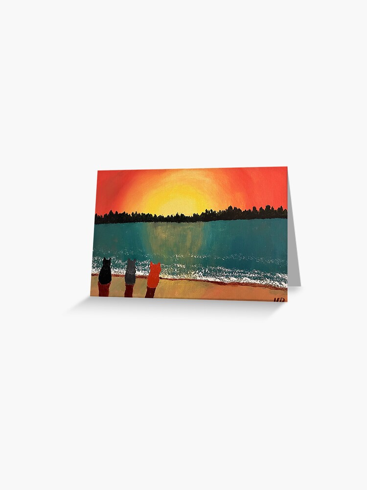Thumbnail 1 of 2, Greeting Card, Three cats on a beach watching the sunset designed and sold by catladyjoy.