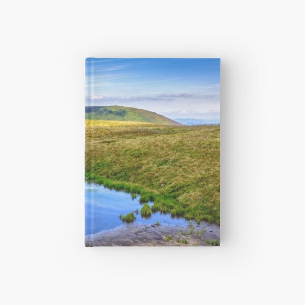 swamp on hill side in mountains Hardcover Journal
