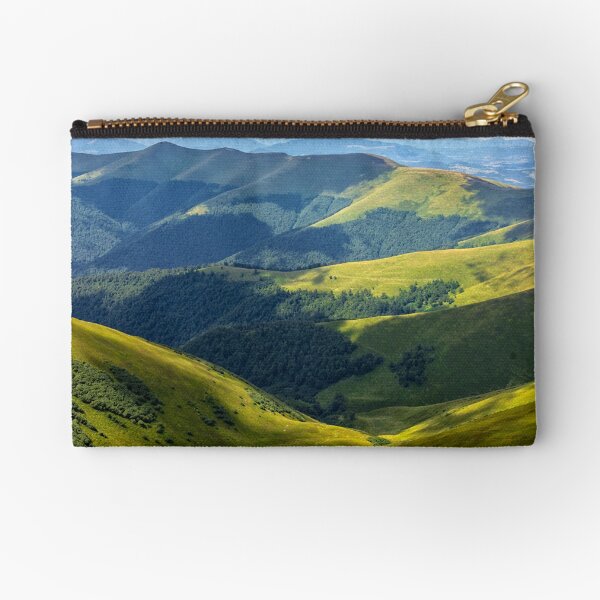 valley between green hills in summer Zipper Pouch
