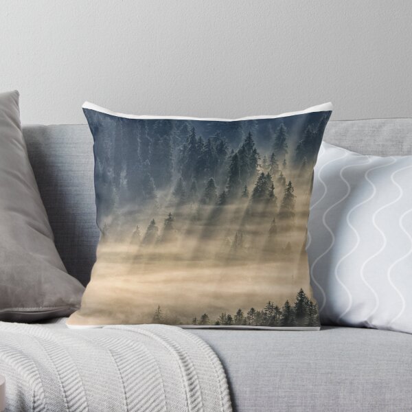 coniferous forest in foggy mountains Throw Pillow