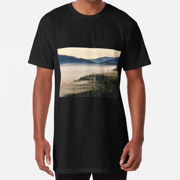 spruce forest on a hill side in fog Long T-Shirt