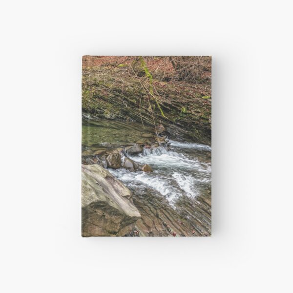 forest river with stones and moss Hardcover Journal