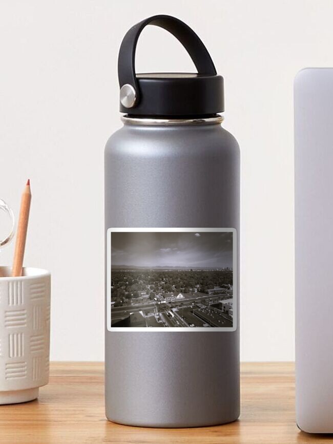 Thumbnail 1 of 3, Sticker, Stillness Gifts Small town view in Colorado - photography, wall art designed and sold by stillnessgifts.