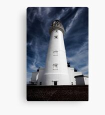 Flamborough Head Lighthouse against blue skies Canvas Print