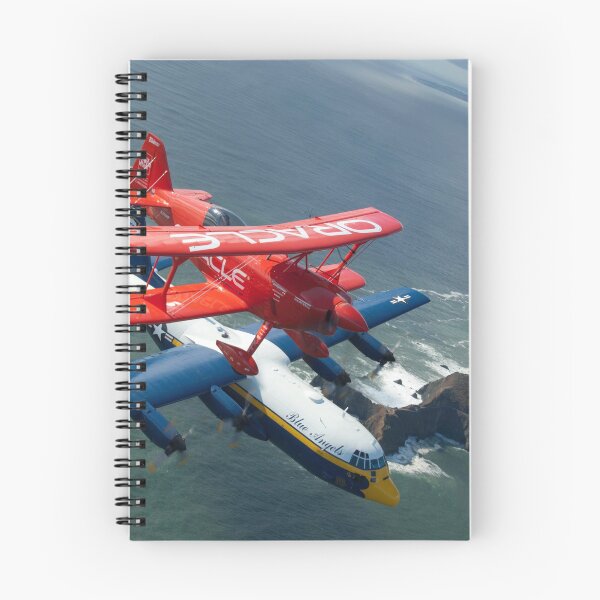 Item preview, A C-130 Hercules Fat Albert aircraft and biplane fly over San Francisco Bay. designed and sold by StocktrekImages.