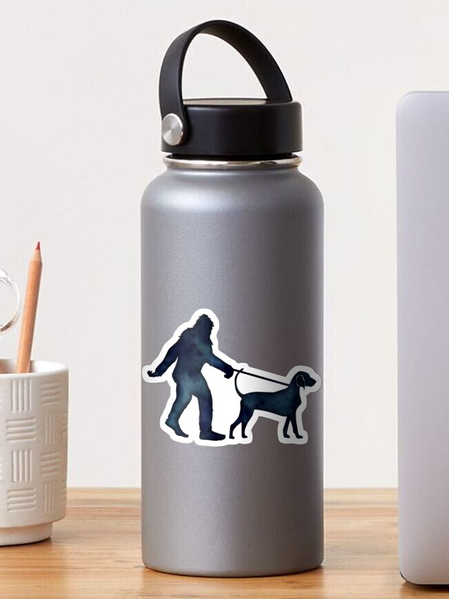 Thumbnail 1 of 3, Sticker, Bigfoot Walking His Bluetick Coonhound designed and sold by TriPodDogDesign.