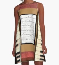 Piano keys with sheet music by Kristie Hubler A-Line Dress