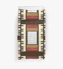 Piano keys with sheet music by Kristie Hubler Duvet Cover