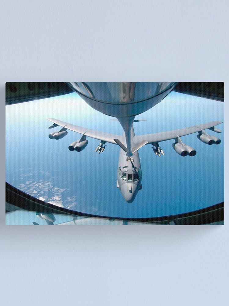 A Kc 135 Stratotanker Refuels A B 52 Stratofortress Over The