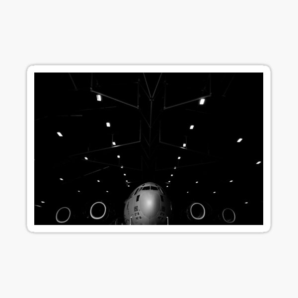 A C-17 Globemaster III sits in a hangar at McChord Field Air Force Base, Washington. Sticker