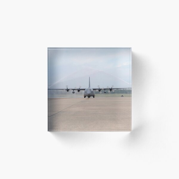 An Air Force C-130E Hercules goes through a fire arch. Acrylic Block