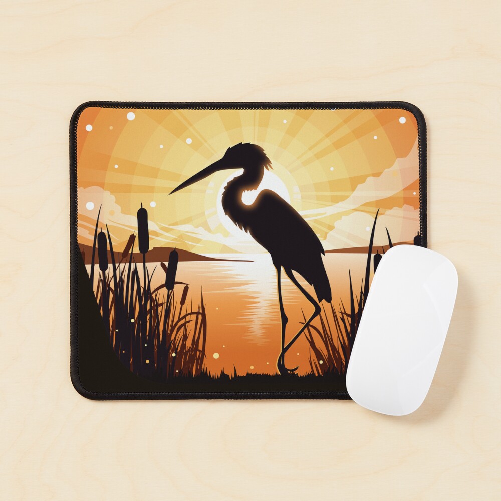 The heron stands on the shore of the lake Mouse Pad