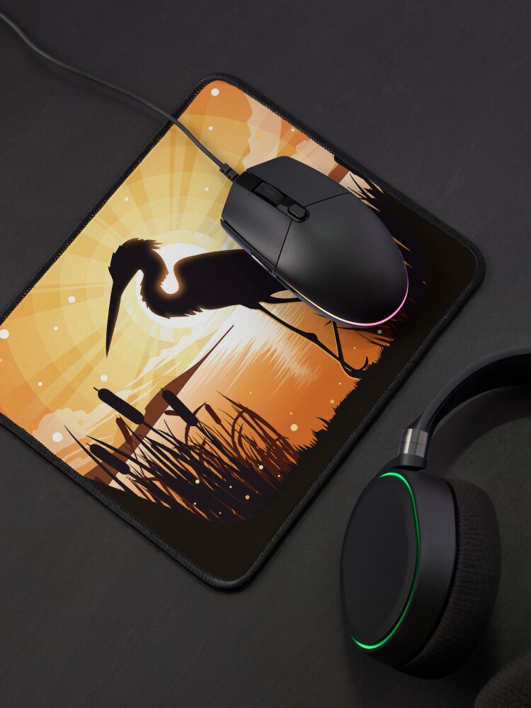 Alternate view of The heron stands on the shore of the lake Mouse Pad