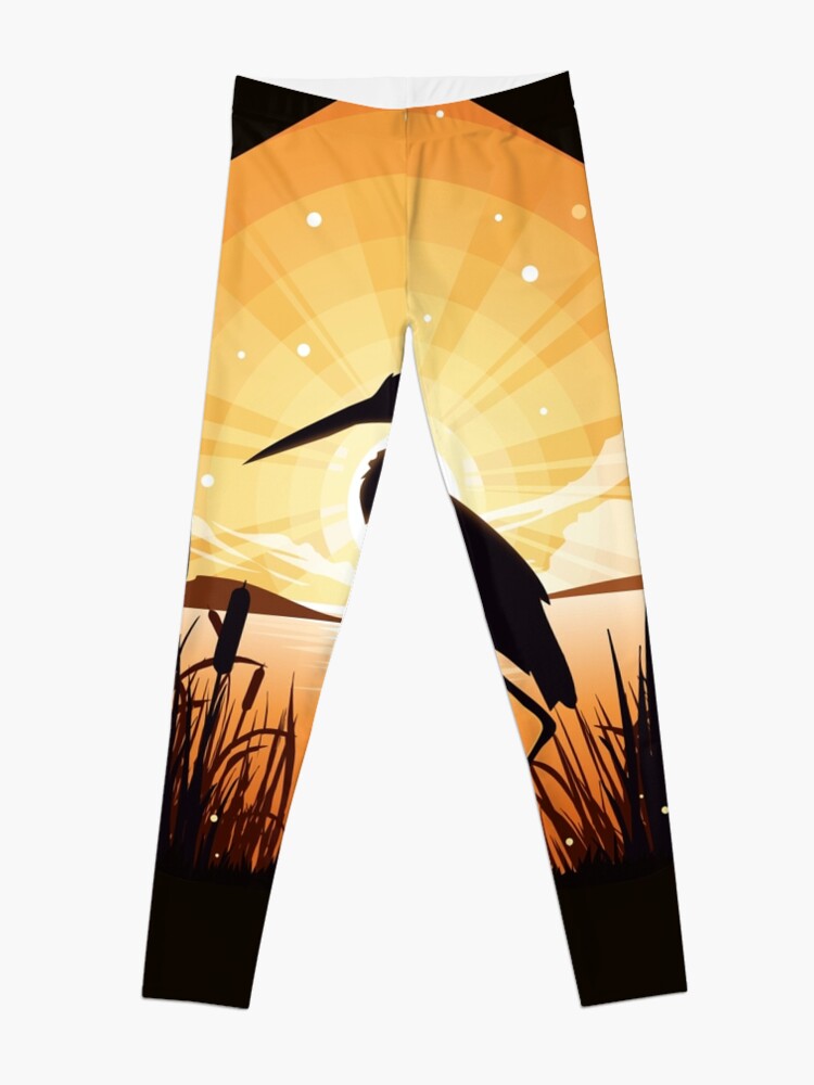 Alternate view of The heron stands on the shore of the lake Leggings