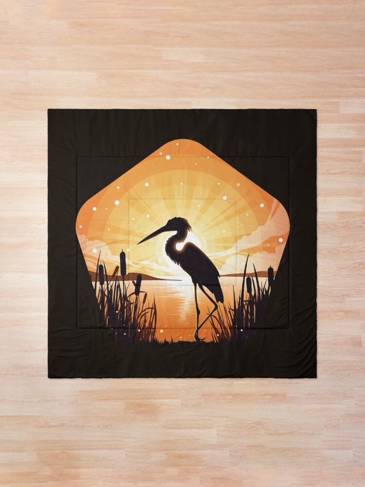 Alternate view of The heron stands on the shore of the lake Comforter