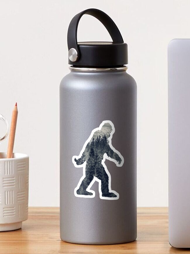 Thumbnail 1 of 3, Sticker, A Sasquatch Silhouette in The North designed and sold by Garaga.