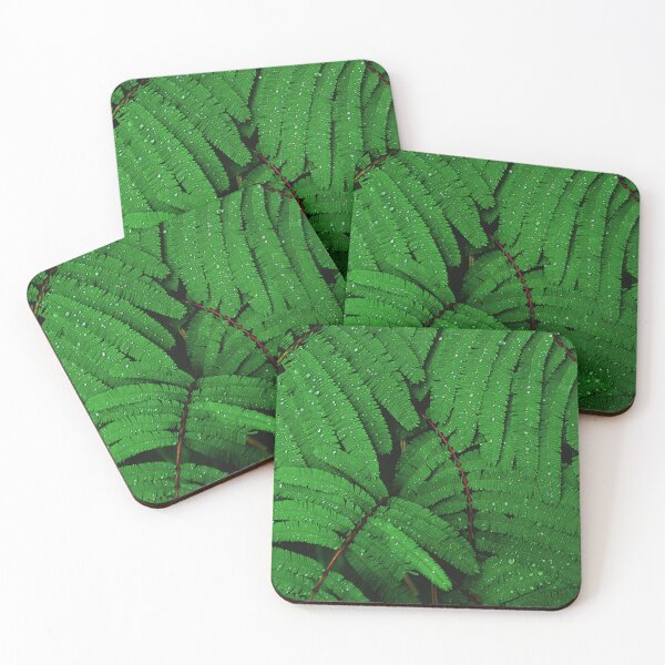 Item preview, Raindrops on Green Leaves Canvas Print designed and sold by Nils Petter Stein.