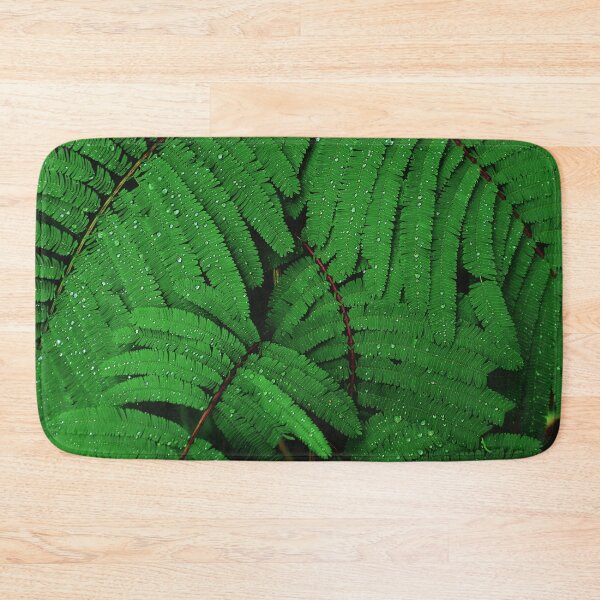 Item preview, Raindrops on Green Leaves Canvas Print designed and sold by Nils Petter Stein.