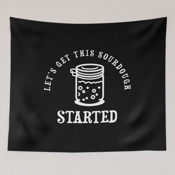 Item preview, sourdough bread starter, crusty bread, artisan bread themed design on a black T-shirt, sticker, and apron.  designed and sold by smichaeliv.