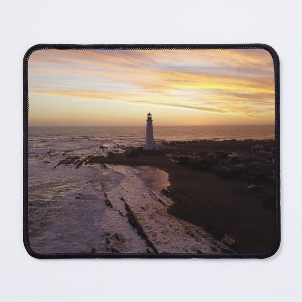 Item preview, Lighthouse On A Sunset Touched Shore designed and sold by Taceo10.
