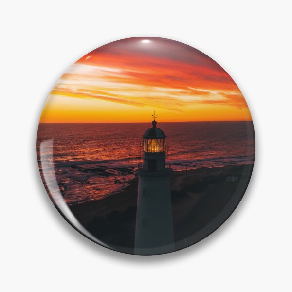 Item preview, Lighthouse On A Sunset Lit Shore designed and sold by Taceo10.