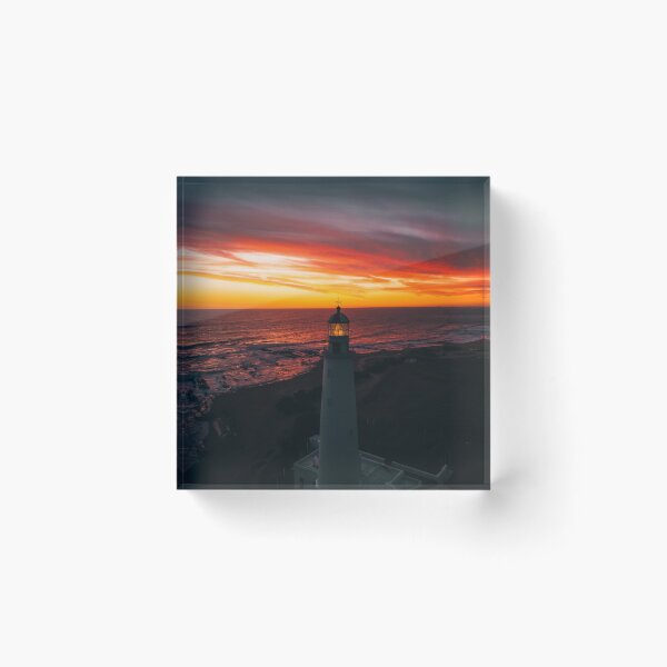 Item preview, Lighthouse On A Sunset Lit Shore designed and sold by Taceo10.