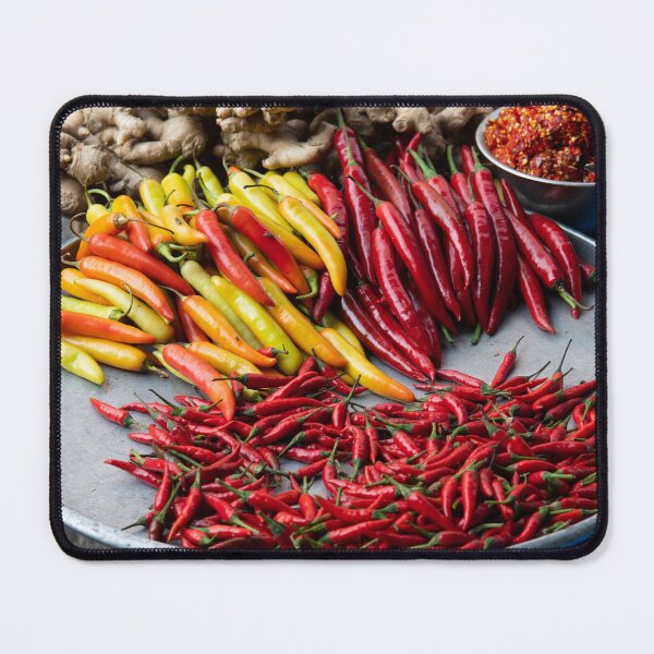 Item preview, Different types of peppers on plate at market in Vietnam designed and sold by krisgreenwood.