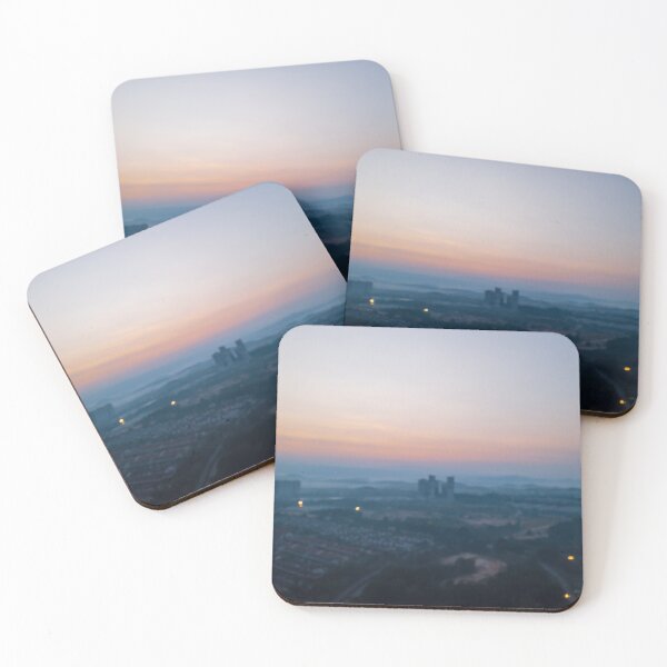 Item preview, Blurry aerial view of the orange sky, sunset sun, and clouds in the town. designed and sold by ellinnur.