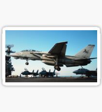 An F-14D Tomcat prepares to land on the flight deck of USS Theodore Roosevelt. Sticker