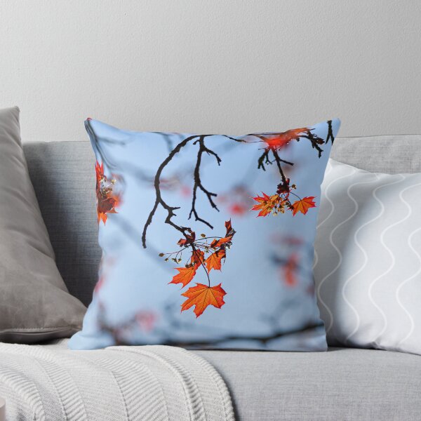Item preview, Autumnal Leaves  clinging on to the tree, against a blue sky designed and sold by CyaniRose.