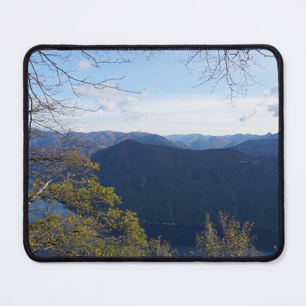 Item preview, Beautiful mountains, lake and green leaves from a tree designed and sold by Shirusu.