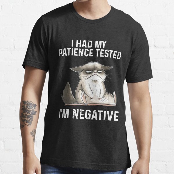 gato divertido Tuve mi paciencia probada Soy NEGATIVO Camiseta esencial