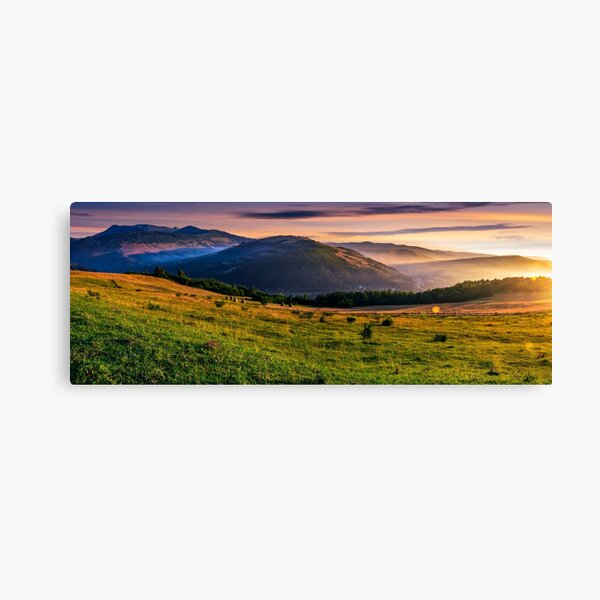 panorama of rural fields in foggy mountains at sunrise Canvas Print