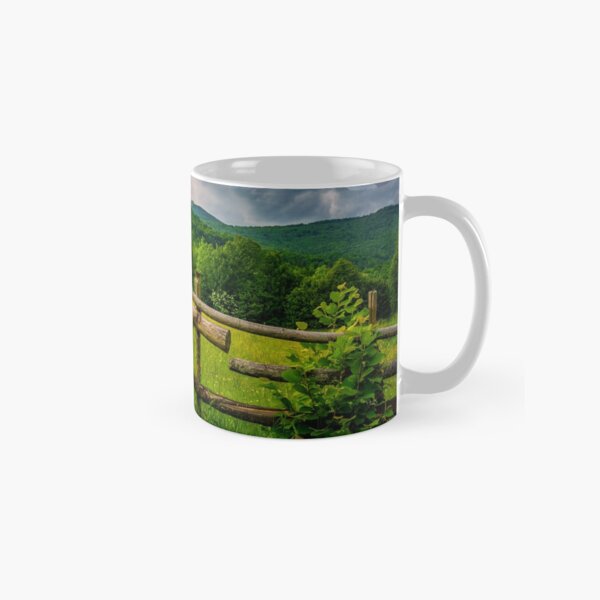 wooden fence on the hillside Classic Mug