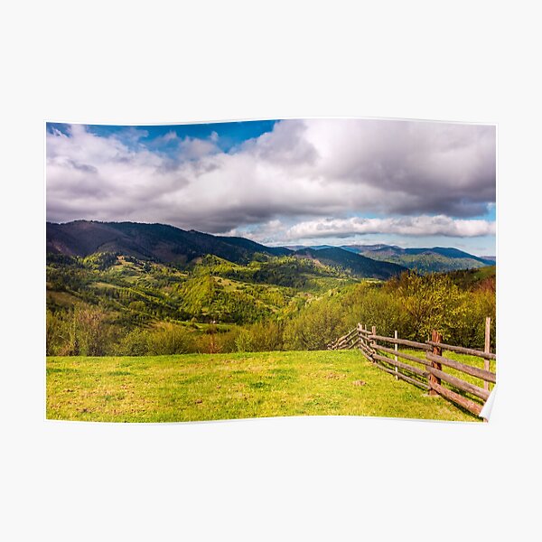 wooden fence on the hillside Poster