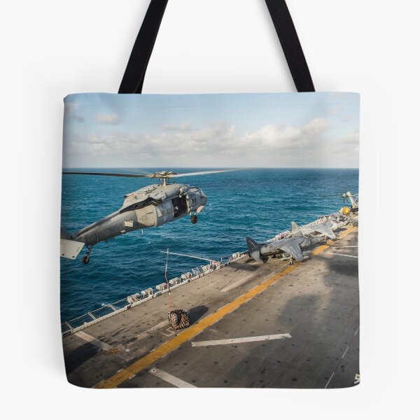 Item preview, STK107790M-An MH-60S Sea Hawk helicopter delivers supplies to USS Bonhomme Richard. designed and sold by StocktrekImages.