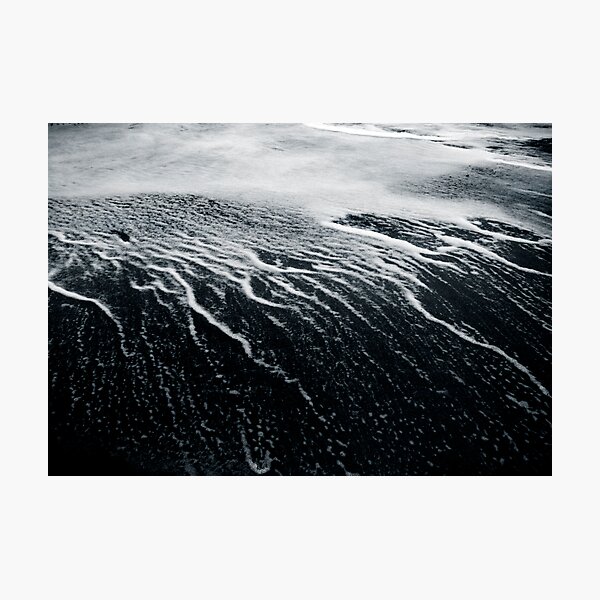 remains of a wave Photographic Print