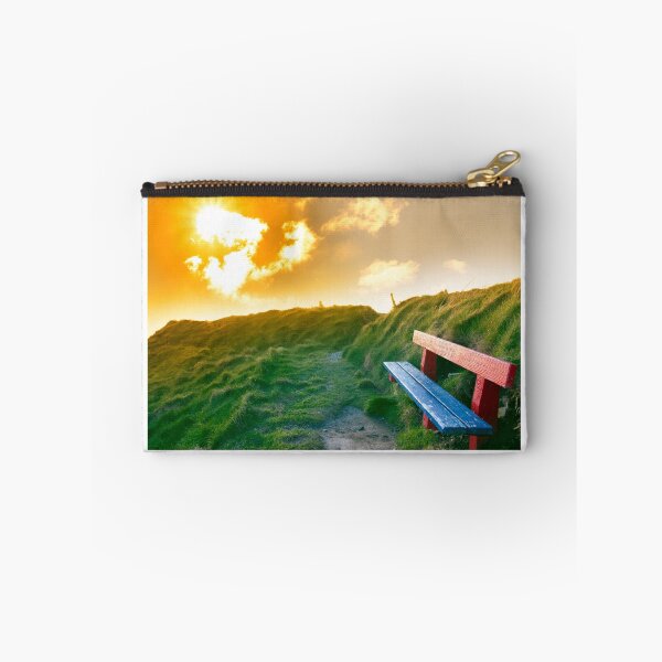 Item preview, bench on a cliff edge with sunset designed and sold by morrbyte.