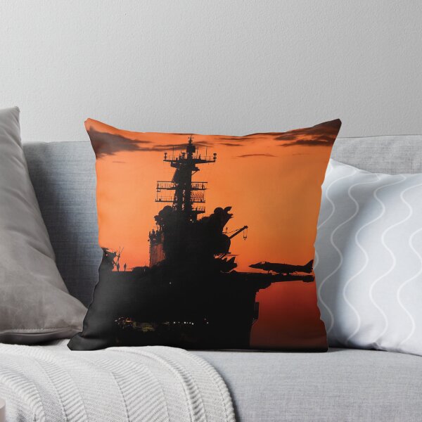 Item preview, STK105023M-The setting sun silhouettes the amphibious assault ship USS Makin Island. designed and sold by StocktrekImages.