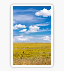 Yellow fields under blue cloudy sky Sticker